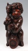 Lot 1341 - A 19th century carved oak figure of Bacchus,...