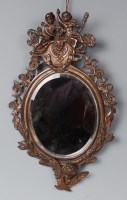 Lot 1352 - A late 19th century Italian bronze wall mirror,...