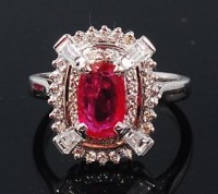 Lot 1158 - A contemporary 14ct white gold, ruby and...