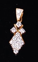 Lot 1193 - A modern yellow metal diamond set lozenge...