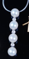 Lot 1219 - A modern 18ct white gold, cultured pearl and...