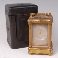 Lot 1474 - A late 19th century French lacquered brass...