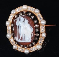 Lot 1255 - A circa 1900 carved shell cameo brooch, the...