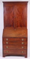 Lot 1497 - A George III mahogany bureau cabinet, the...
