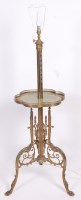 Lot 1498 - An Edwardian cast, pierced and engraved brass...