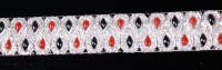 Lot 1288 - A white metal, diamond, black onyx and coral...