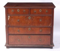 Lot 1503 - A circa 1700 oak and figured walnut chest, of...