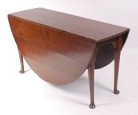Lot 1515 - A George III oak dropleaf table, having...