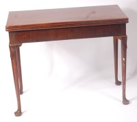 Lot 1516 - A late George II mahogany fold-over tea table,...