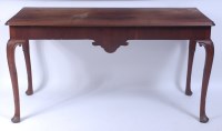 Lot 1521 - A mid-18th century walnut hall table, having a...
