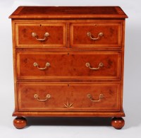 Lot 1531 - A burr walnut and crossbanded chest, in the...