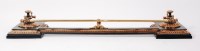 Lot 1535 - A circa 1830 cast brass and iron fire fender,...