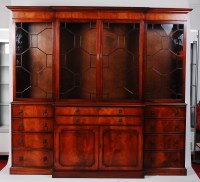 Lot 1537 - A Georgian style mahogany breakfront...