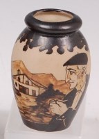 Lot 24 - A French Ciboure pottery miniature vase, of...