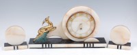 Lot 109 - An Art Deco marble, onyx and black slate three...