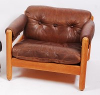 Lot 267 - A 1960s Danish light oak and buffalo leather...