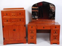 Lot 277 - A late Arts & Crafts oak linenfold panelled...