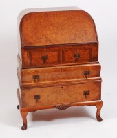 Lot 278 - An Art Deco figured walnut and crossbanded...