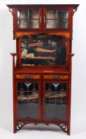 Lot 280 - An Art Nouveau Glasgow School style walnut and...