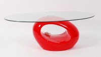 Lot 288 - A 1980s oval clear glass topped and red...