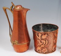 Lot 137 - An Art Nouveau WMF hammered copper and brass...