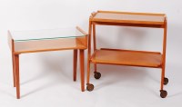 Lot 244 - A 1950s light oak two tier tea trolley, having...