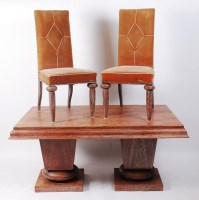 Lot 245 - A 1940s French limed oak dining suite by...