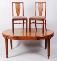 Lot 246 - A French Art Nouveau oak dining suite by...