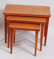 Lot 255 - A 1960s oak nest of three round cornered...