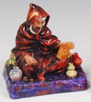 Lot 1 - A Royal Doulton ceramic figure 'The Potter',...
