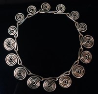 Lot 61 - After a design for Christian Dior - An 18ct...