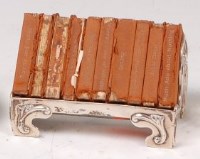 Lot 85 - An Art Nouveau silver miniature book trough,...