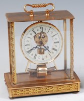 Lot 107 - A gilt brass cased and four glass Kundo...