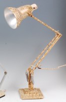 Lot 118 - A Herbert Terry cream painted and gilt splash...