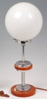 Lot 120 - An Art Deco walnut and chrome table lamp,...