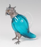 Lot 1081 - A blown blue and clear glass small claret jug...