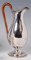 Lot 1156 - An Edwardian silver pedestal ewer, of slender...