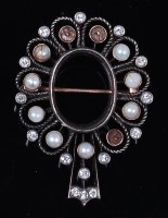 Lot 1209 - A circa 1900 yellow metal, pearl and diamond...
