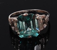 Lot 1227 - A white metal, blue topaz and diamond set...
