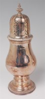 Lot 1111 - A silver pedestal lighthouse sugar caster, in...