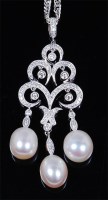 Lot 1252 - A contemporary 18ct white gold, diamond and...