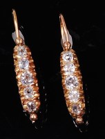 Lot 1254 - A pair of early 20th century yellow metal and...