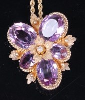 Lot 1275 - A pinchbeck, amethyst and diamond pendant,...