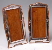 Lot 1135 - A matched pair of Art Nouveau silver...