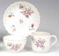 Lot 667 - A first period Worcester trio, comprising tea...