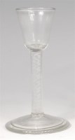 Lot 702 - A mid-18th century cordial glass, having round...