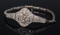 Lot 757 - An Art Deco white metal and diamond set...