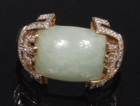 Lot 780 - A modern 9ct gold, jade and diamond set dress...