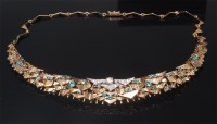 Lot 781 - A modern 9ct gold diamond and blue topaz set...