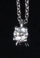Lot 782 - A Tiffany & Co diamond pendant, the four claw...